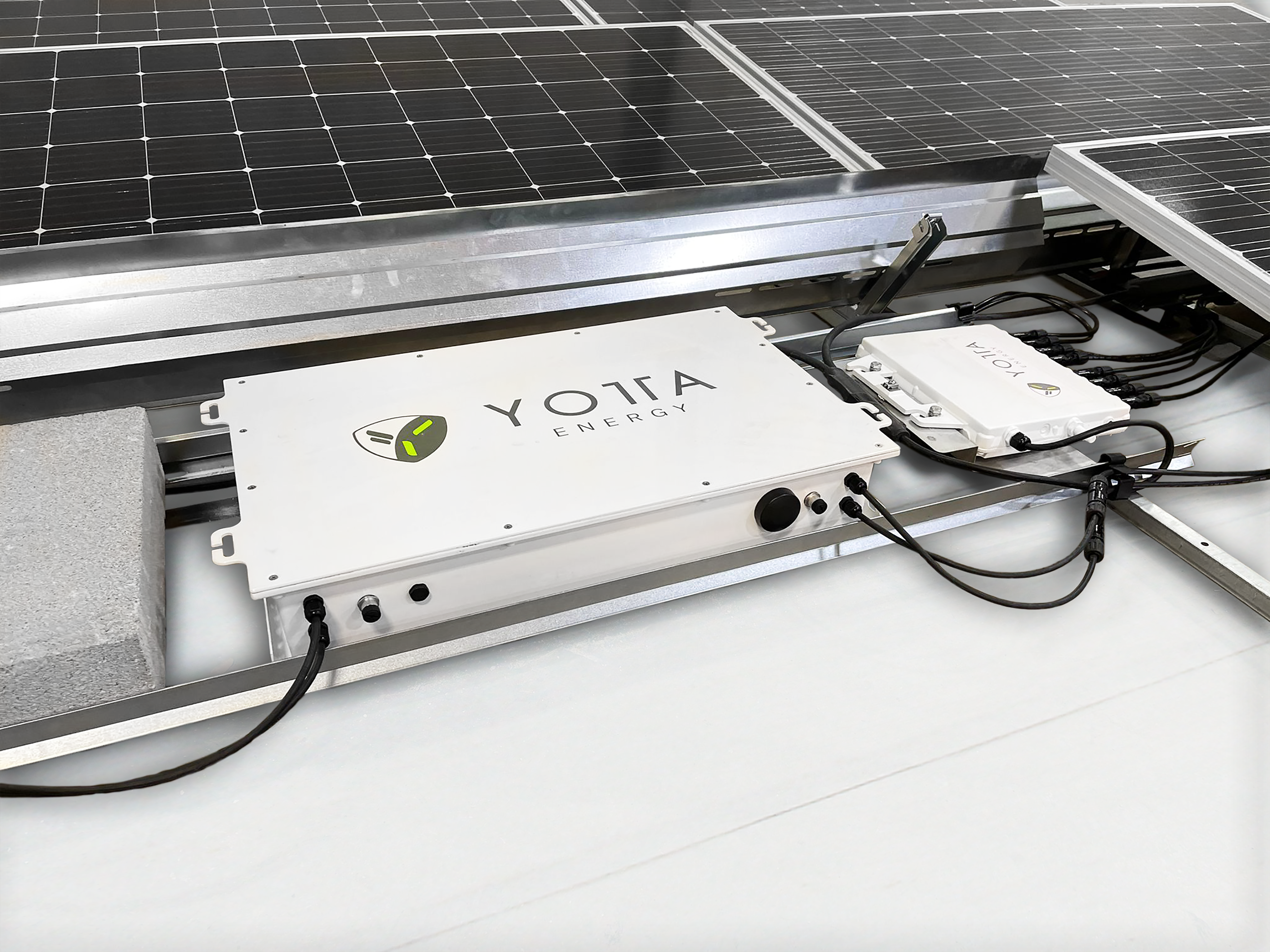 Deploying 1 kWh batteries under solar panels to reduce the cost of solar and storage at commercial properties. (Image: Yotta Energy)